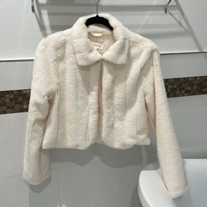 Elegant for the winter night out. Add to a dress or nice outfit.